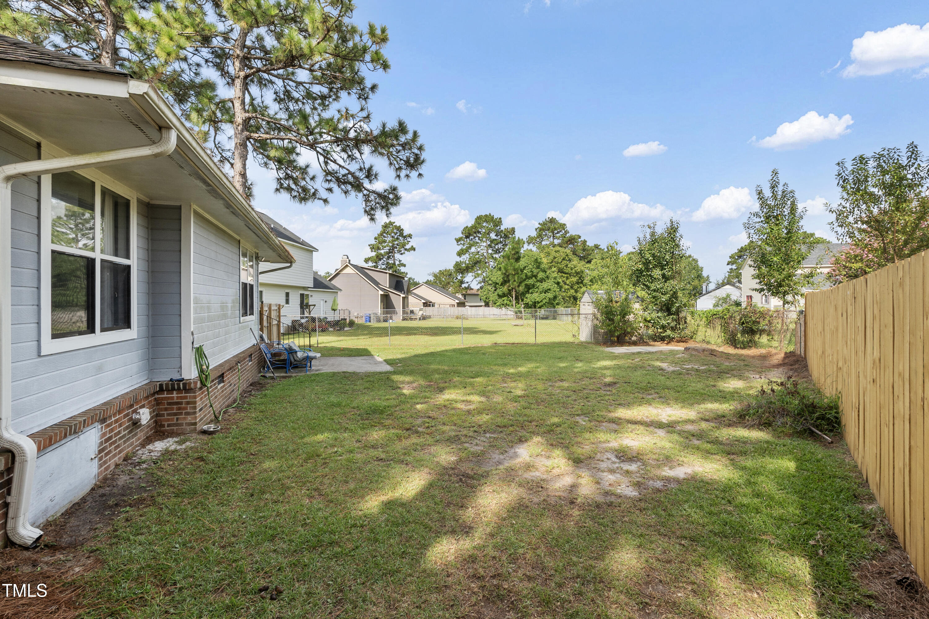 508 Duncan Road Spring Lake, NC 28390 - Photo 20 of 20 a view of a house with a big yard