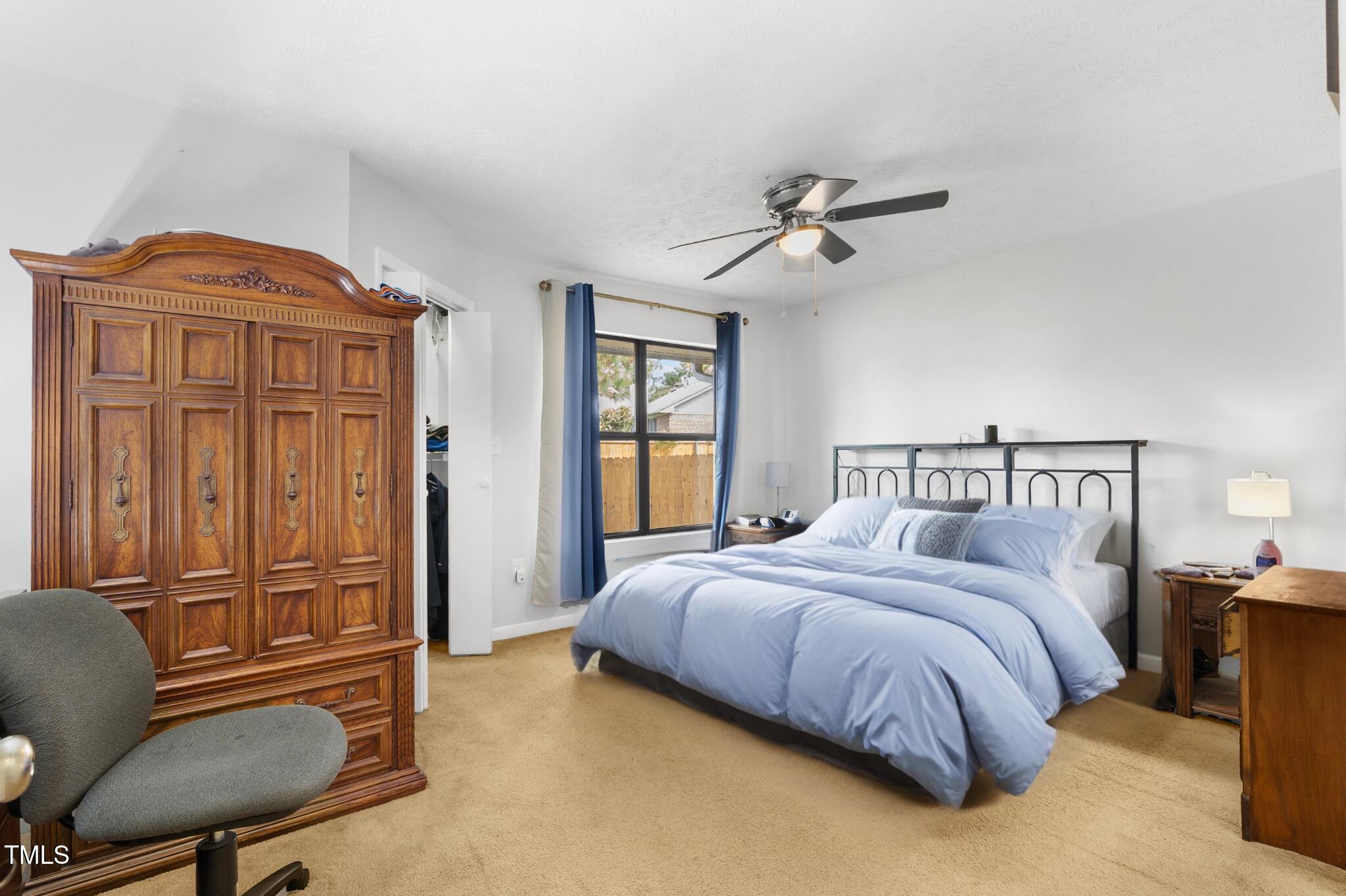 508 Duncan Road Spring Lake, NC 28390 - Photo 10 of 20 a bedroom with a bed dresser and a window
