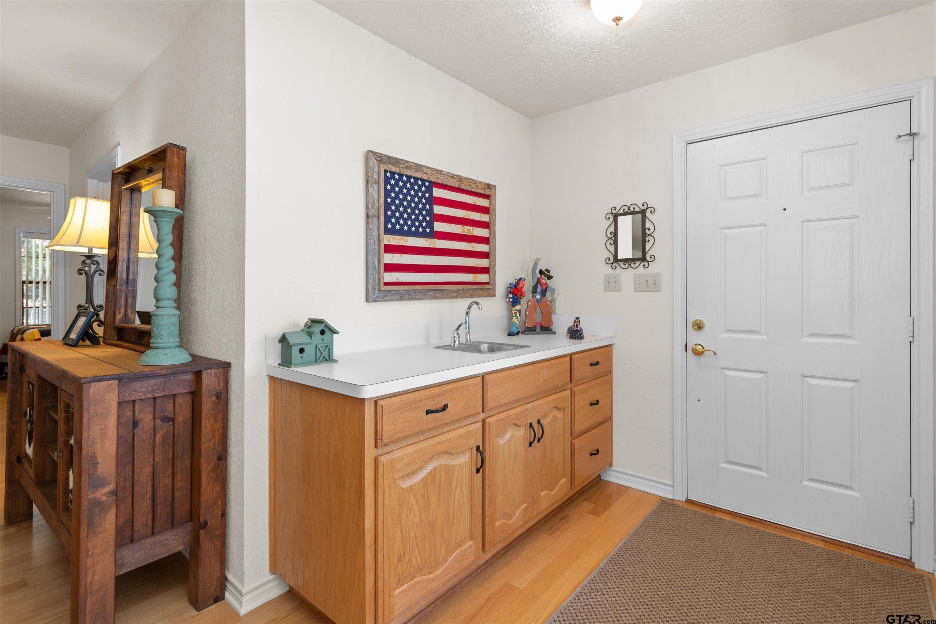 386 Dailey Road Crockett, TX 75835 - Photo 14 of 28 a kitchen with stainless steel appliances granite countertop a stove and a sink