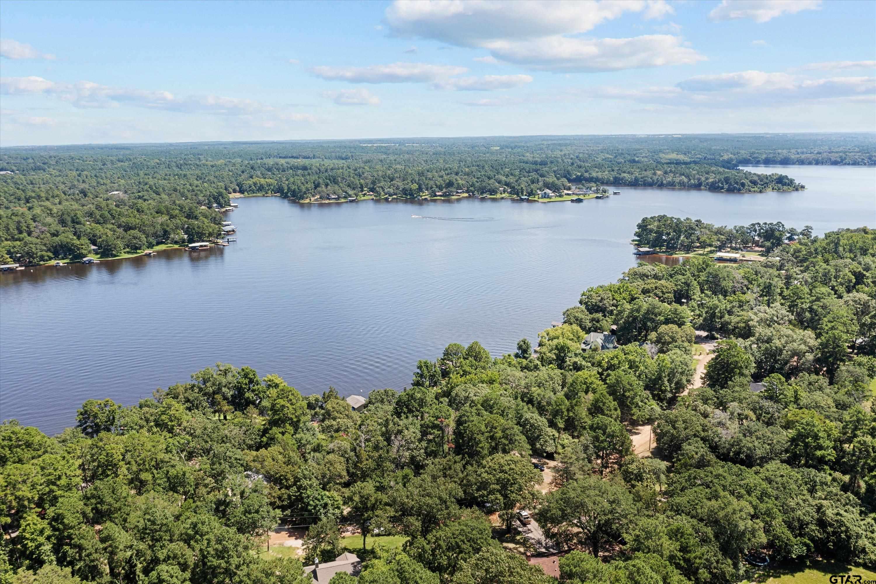 386 Dailey Road Crockett, TX 75835 - Photo 2 of 28 an aerial view of a houses with a lake view