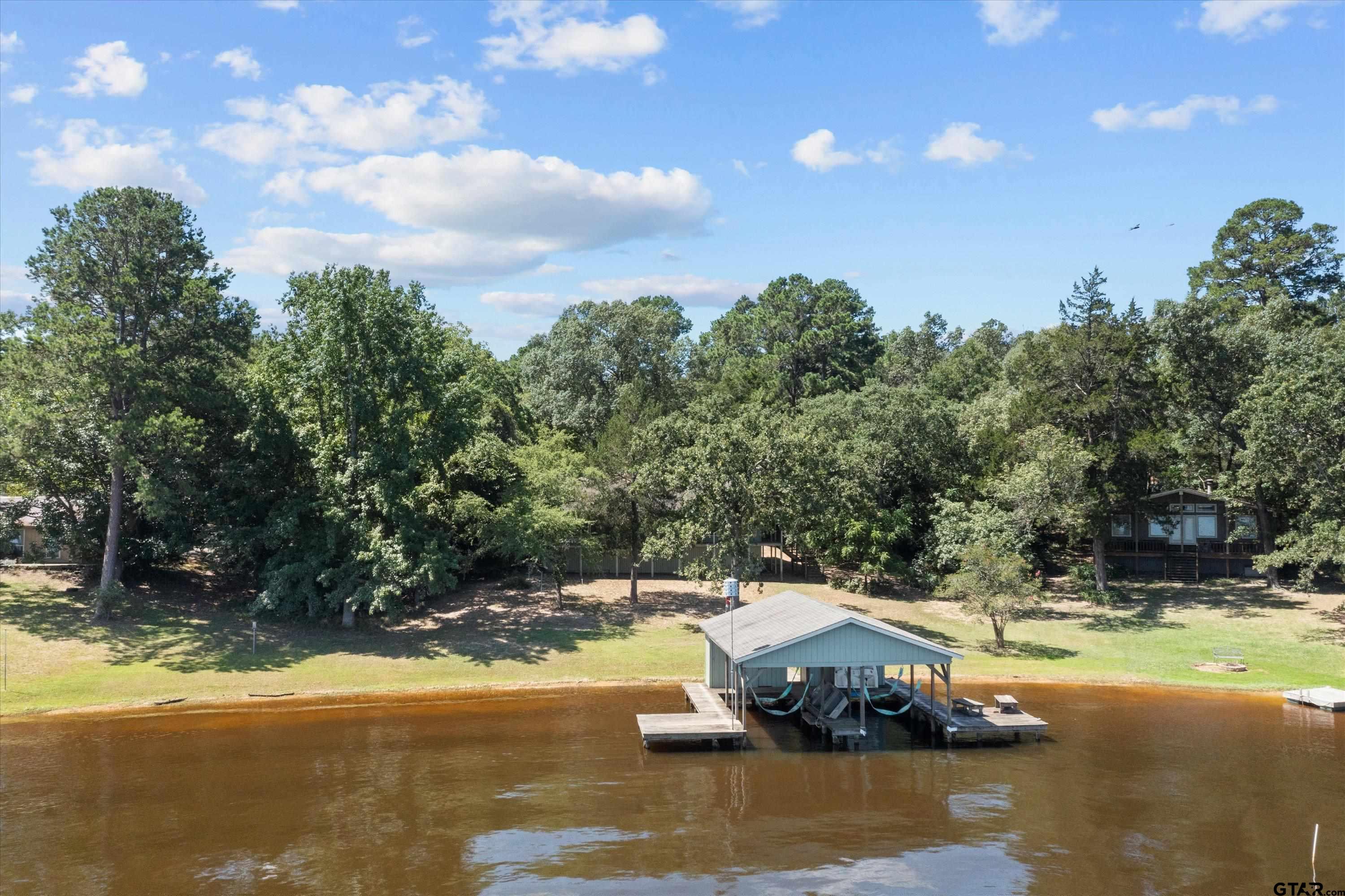 386 Dailey Road Crockett, TX 75835 - Photo 24 of 28 a view of swimming pool with a yard
