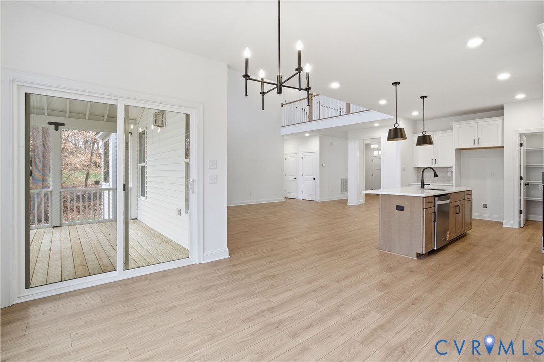 1404 Mill Quarter Road Powhatan, VA 23139 - Photo 13 of 29 a view of a kitchen with a sink stainless steel appliances and cabinets