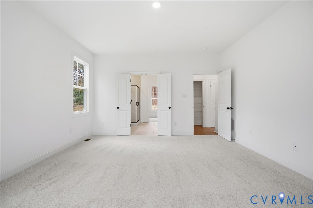 1404 Mill Quarter Road Powhatan, VA 23139 - Photo 14 of 29 a view of an empty room with a window