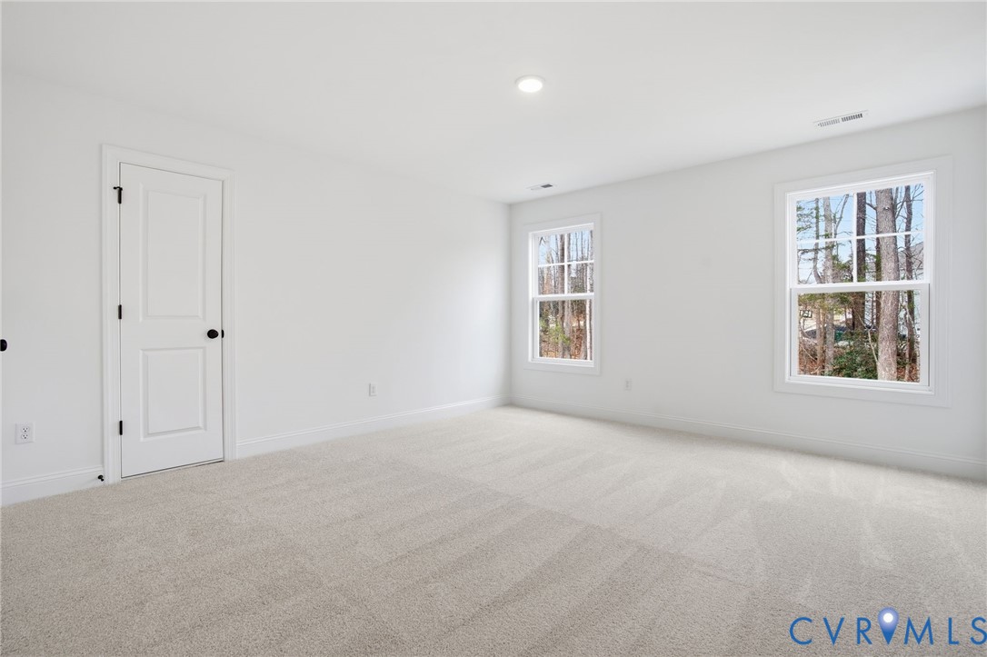 1404 Mill Quarter Road Powhatan, VA 23139 - Photo 19 of 29 a view of an empty room with a window