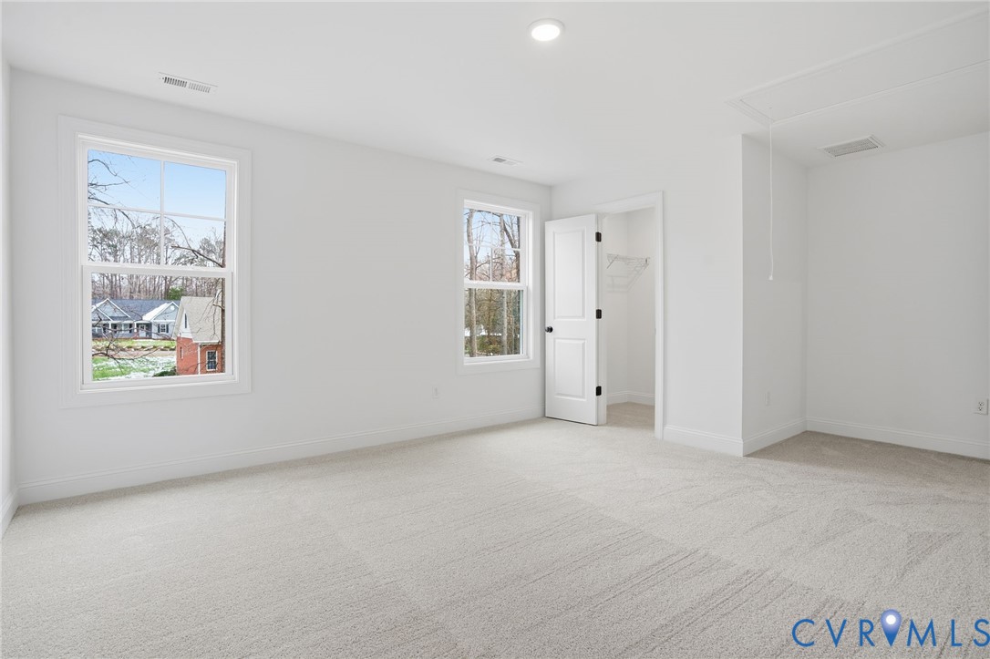 1404 Mill Quarter Road Powhatan, VA 23139 - Photo 20 of 29 an empty room with windows