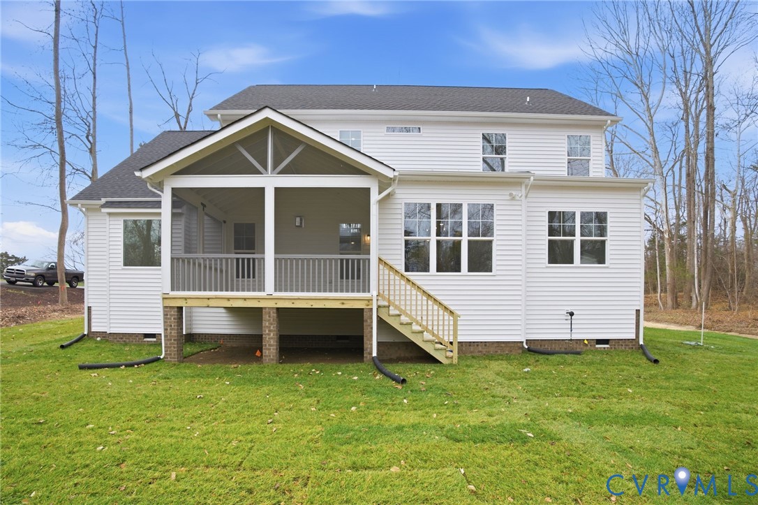 1404 Mill Quarter Road Powhatan, VA 23139 - Photo 27 of 29 a front view of a house with a yard