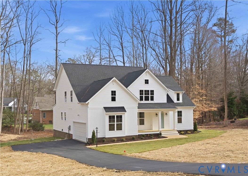 1404 Mill Quarter Road Powhatan, VA 23139 - Photo 5 of 29 a front view of a house with a yard