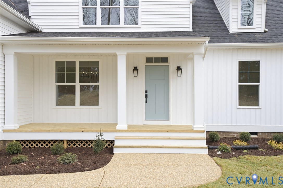 1404 Mill Quarter Road Powhatan, VA 23139 - Photo 6 of 29 a front view of a house with a outdoor space