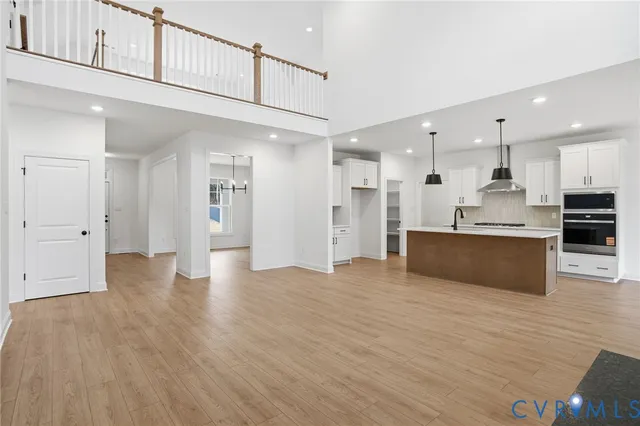 a view of kitchen with wooden floor