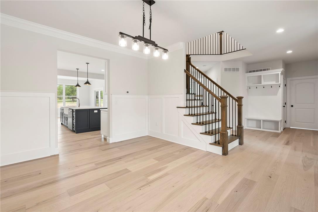 Hottle Road Quakertown, PA 18951 - Photo 21 of 59 Gleaming hardwood floors and classic wainscoting define this welcoming entryway featuring a handsome staircase.
