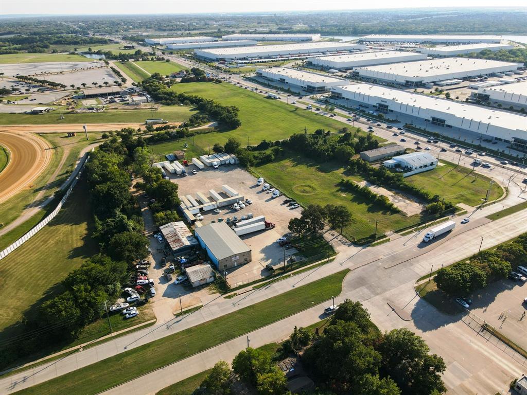 2578 North Belt Line Road Grand Prairie, TX 75050 - Photo 6 of 8 an aerial view of residential houses with outdoor space