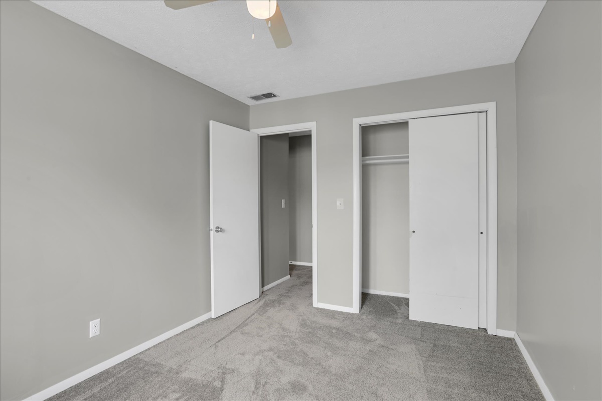 1717 King Drive, Unit B Normal, IL 61761 - Photo 12 of 18 an empty room with closet area