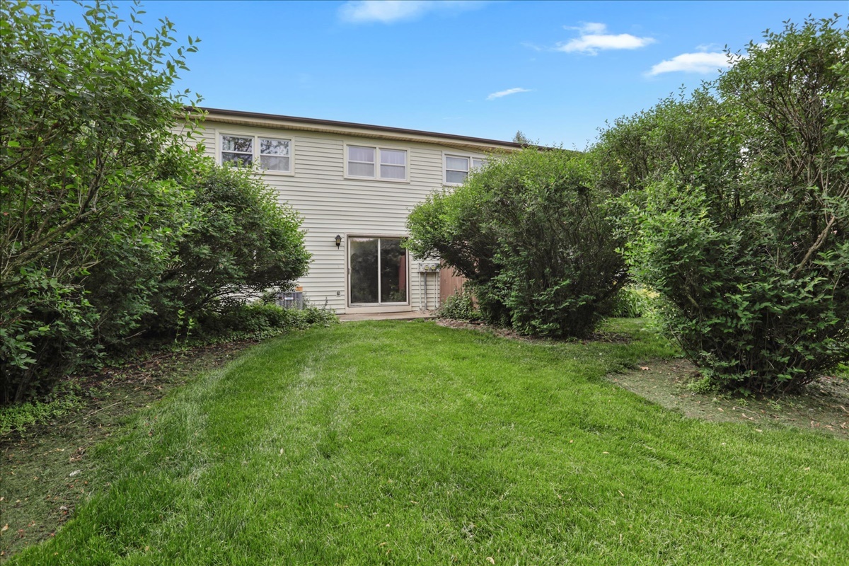 1717 King Drive, Unit B Normal, IL 61761 - Photo 18 of 18 a view of a house with backyard and garden