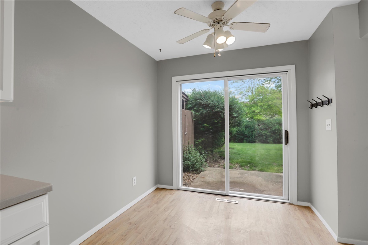 1717 King Drive, Unit B Normal, IL 61761 - Photo 4 of 18 a view of a livingroom with a ceiling fan and window