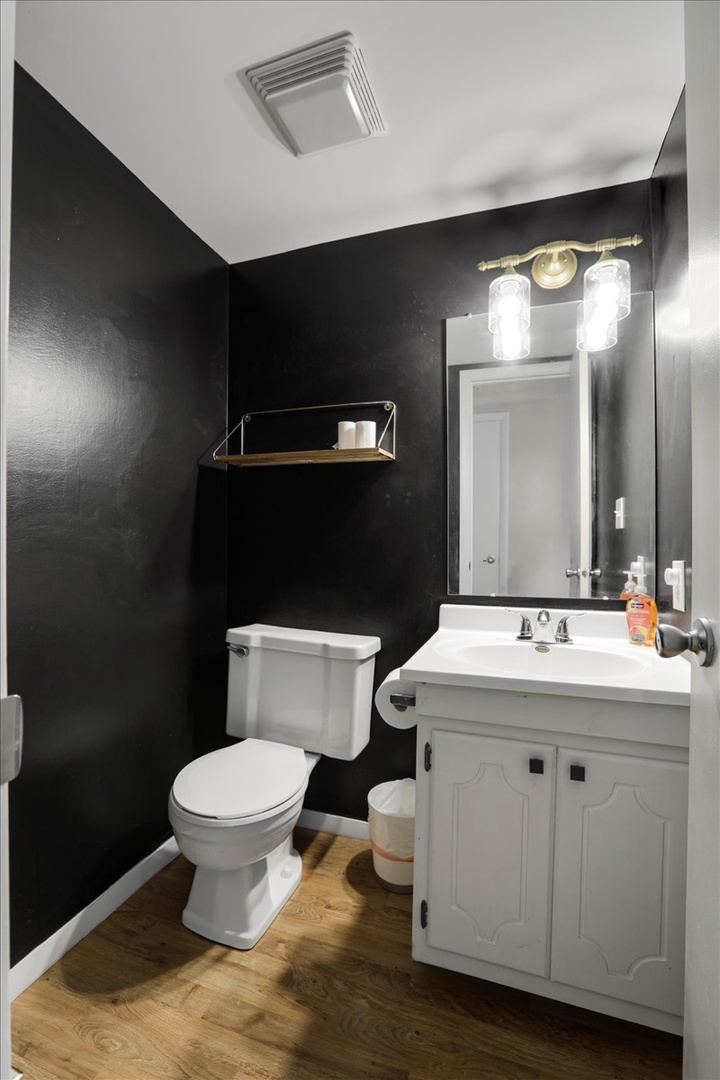 1717 King Drive, Unit B Normal, IL 61761 - Photo 8 of 18 a bathroom with a sink a toilet and mirror