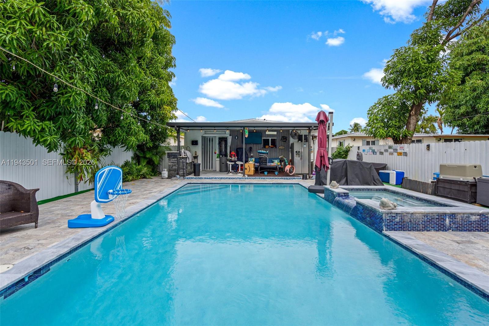 864 East 29th Street Hialeah, FL 33013 - Photo 12 of 16 a view of a backyard with swimming pool