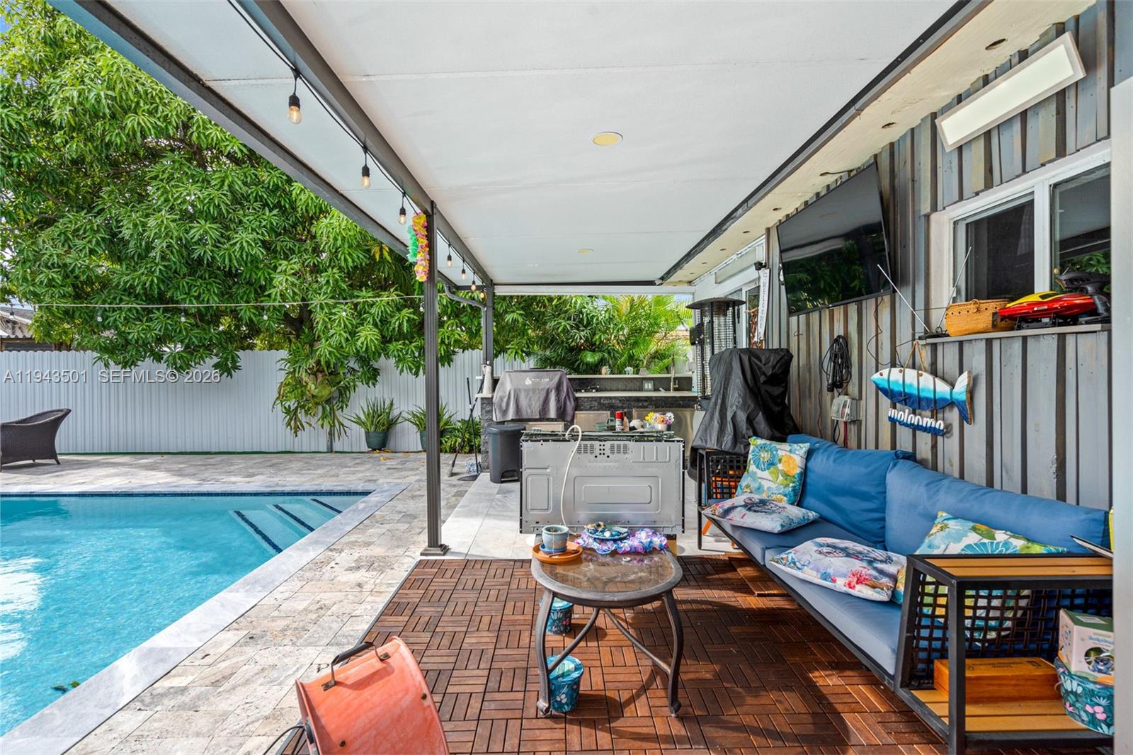 864 East 29th Street Hialeah, FL 33013 - Photo 7 of 16 a outdoor living space with furniture and garden view