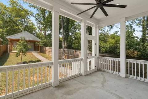 a view of a porch with furniture