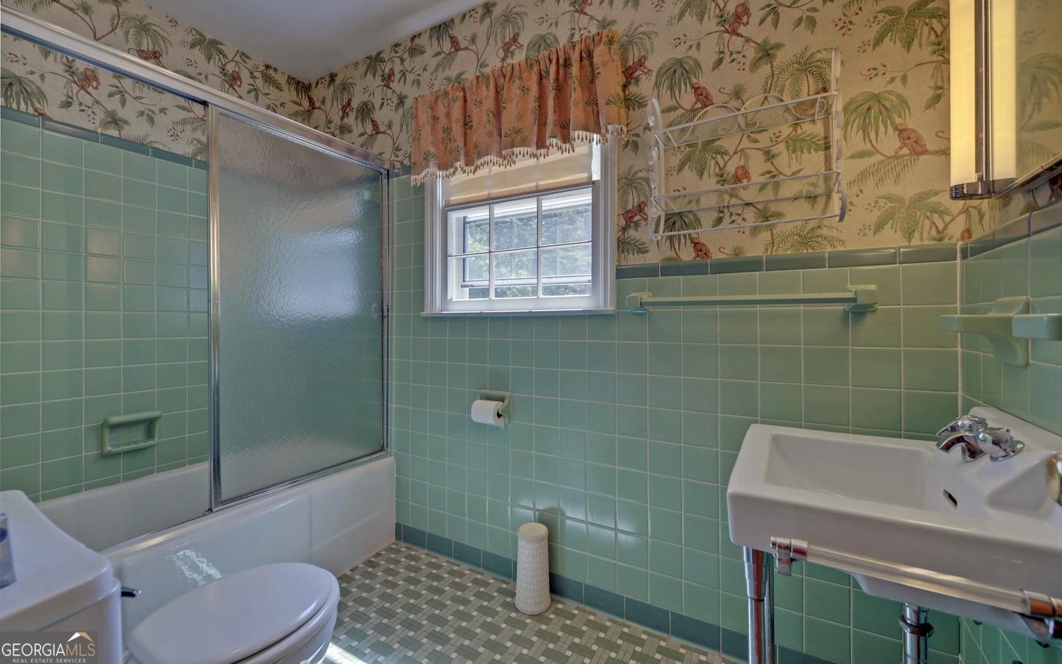 400 Harris Street Toccoa, GA 30577 - Photo 32 of 49 a bathroom with a sink toilet and shower