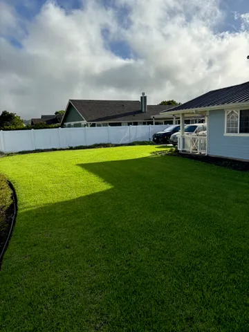a view of a swimming pool with an outdoor seating and hardwood