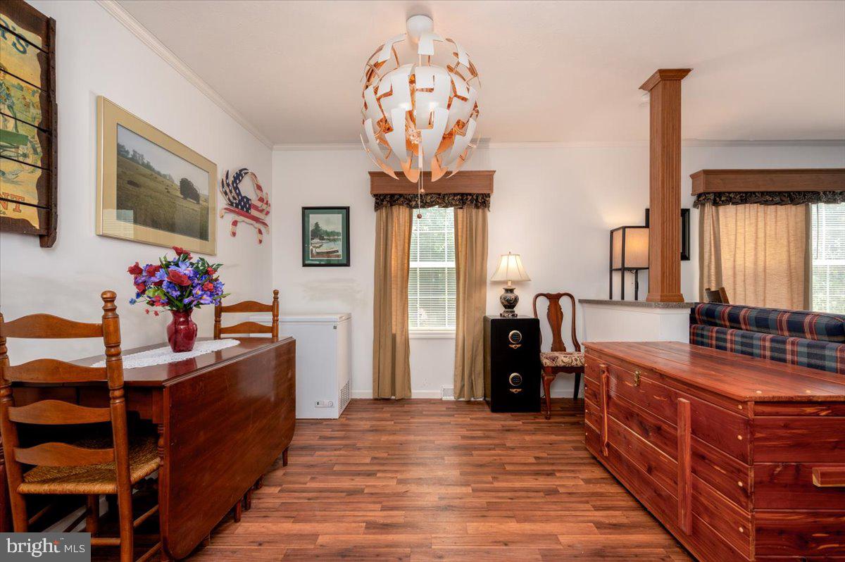 302 Berts Drive Lothian, MD 20711 - Photo 16 of 38 a kitchen with stainless steel appliances granite countertop a sink and a stove