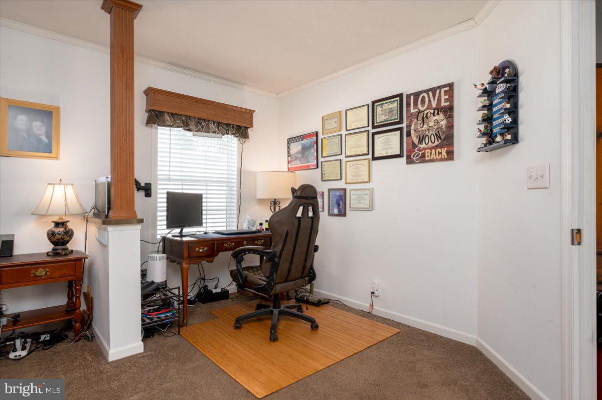302 Berts Drive Lothian, MD 20711 - Photo 23 of 38 a view of a workspace with furniture and a window