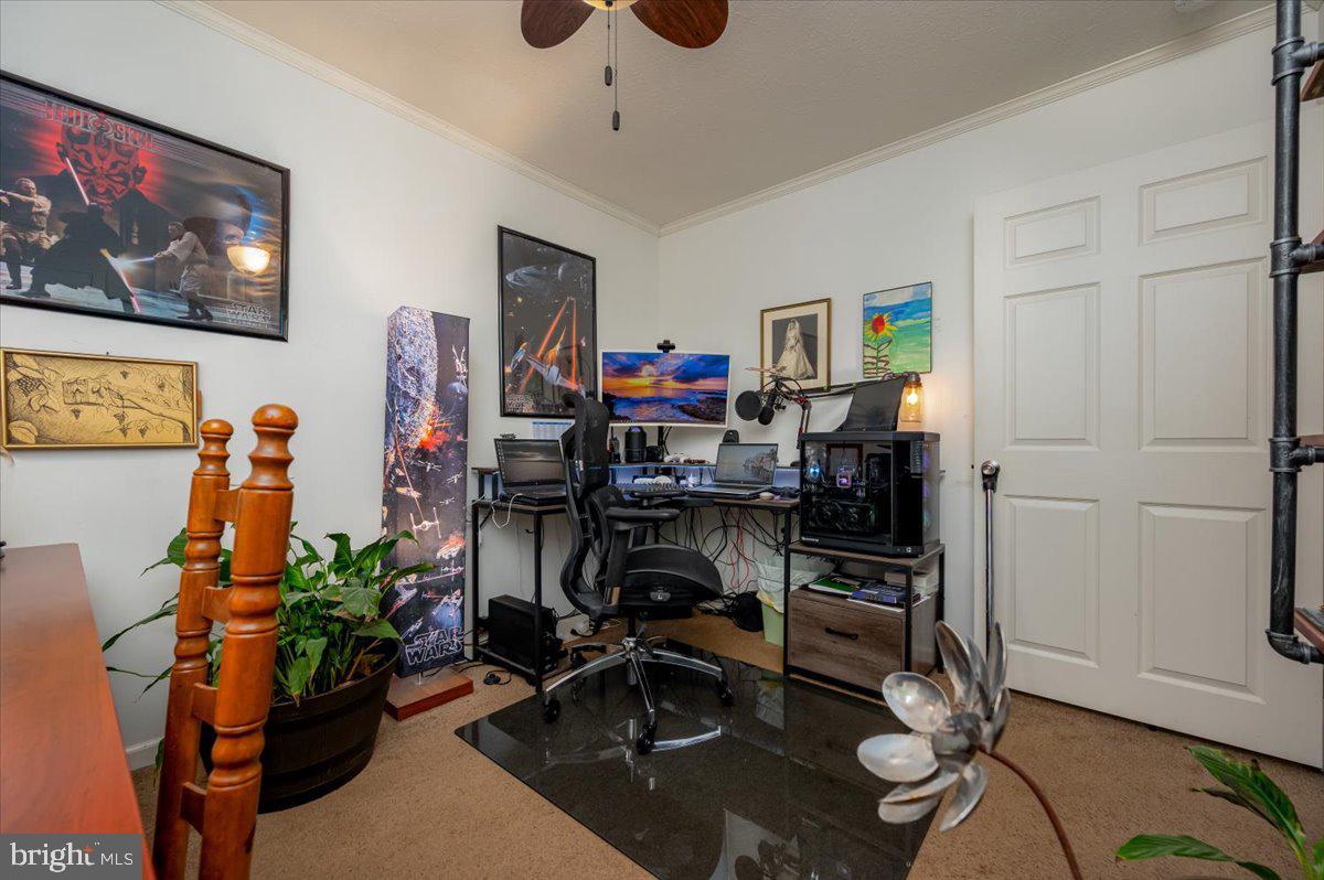 302 Berts Drive Lothian, MD 20711 - Photo 32 of 38 a view of a room with gym equipment