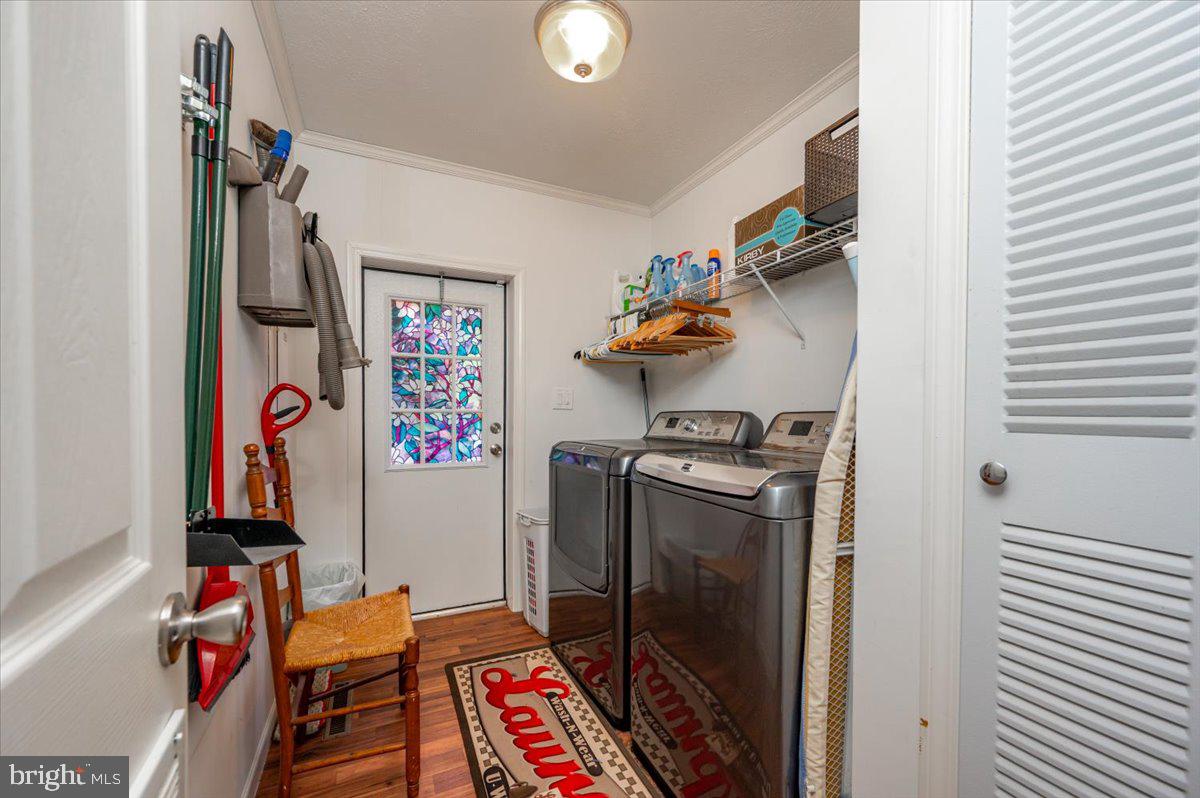 302 Berts Drive Lothian, MD 20711 - Photo 33 of 38 a utility room with dryer and washer