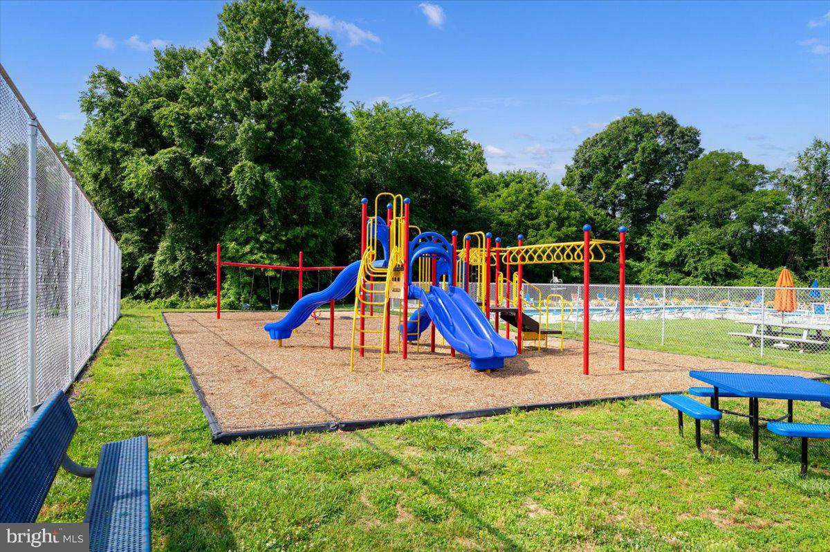 302 Berts Drive Lothian, MD 20711 - Photo 34 of 38 a view of park with slide and a slide