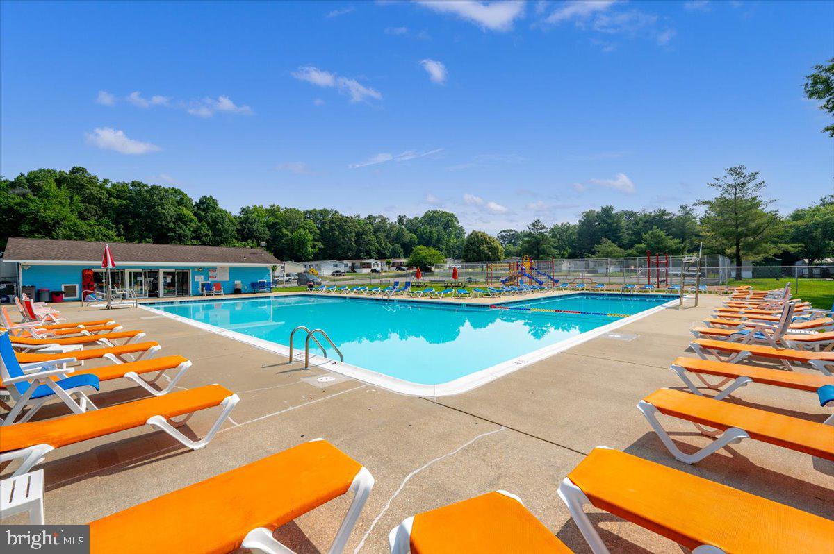 302 Berts Drive Lothian, MD 20711 - Photo 38 of 38 an outdoor space with lounge chair and swimming pool