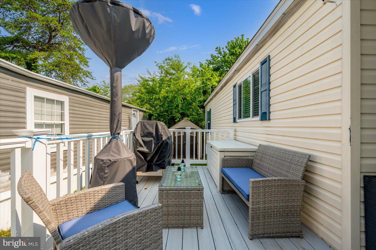 302 Berts Drive Lothian, MD 20711 - Photo 8 of 38 a view of deck with patio
