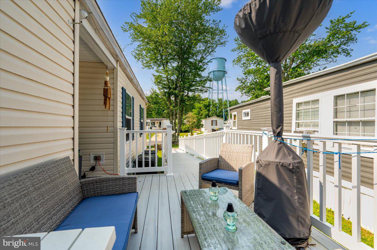 302 Berts Drive Lothian, MD 20711 - Photo 9 of 38 a view of deck with patio