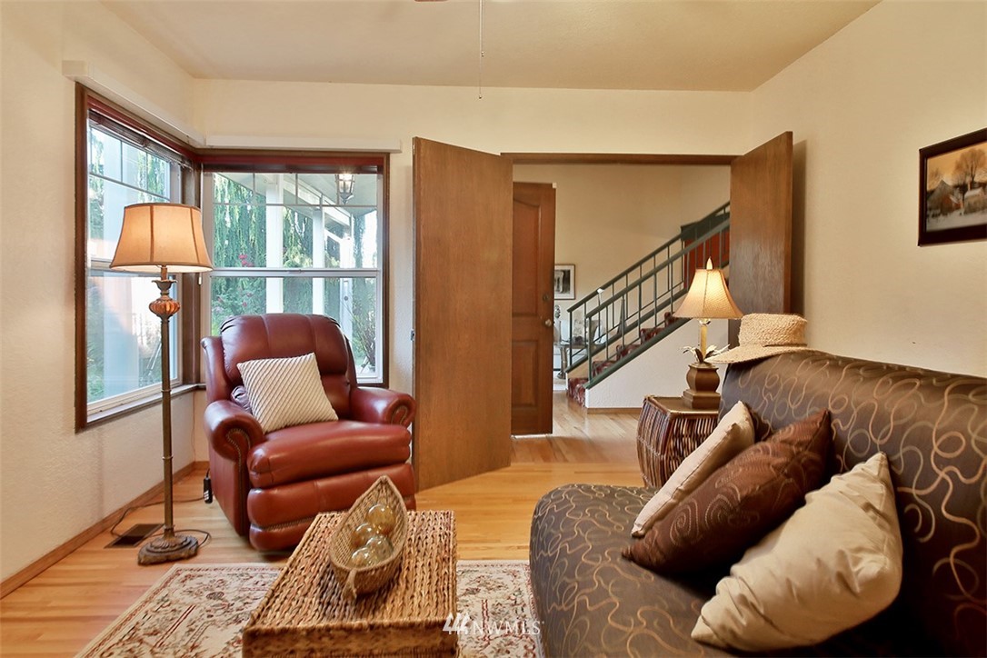 5749 Double Bluff Road Freeland, WA 98249 - Photo 13 of 40 a living room with furniture and a window