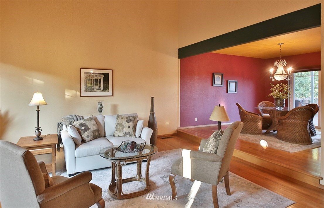 5749 Double Bluff Road Freeland, WA 98249 - Photo 14 of 40 a living room with furniture and a lamp