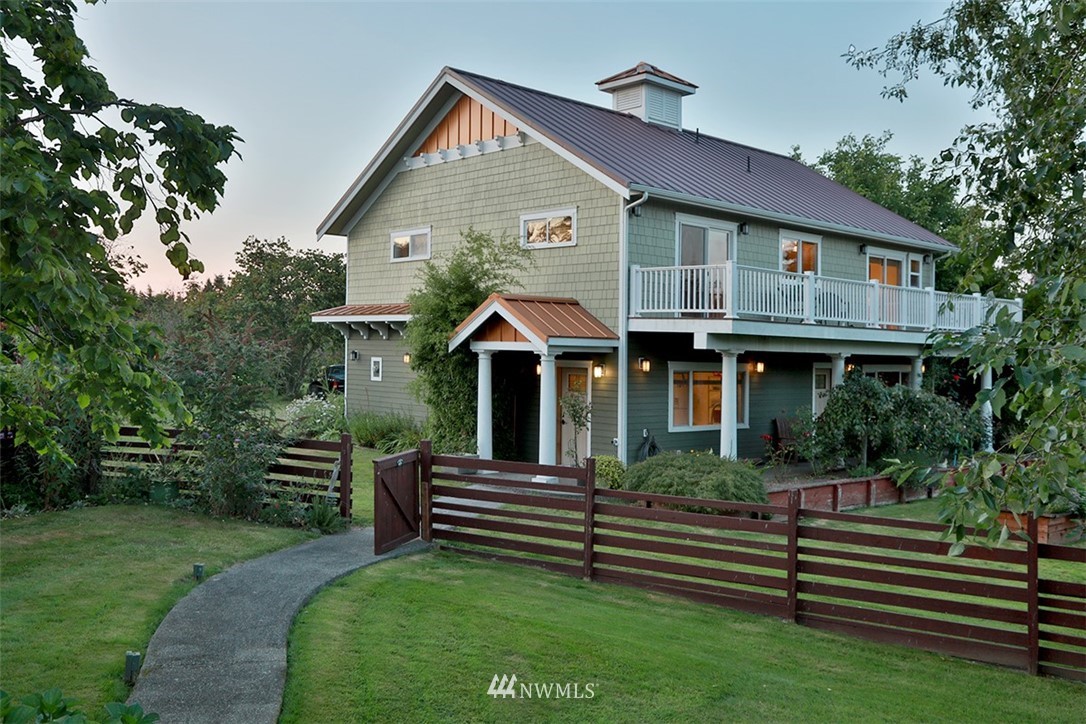 5749 Double Bluff Road Freeland, WA 98249 - Photo 28 of 40 a front view of a house with a yard