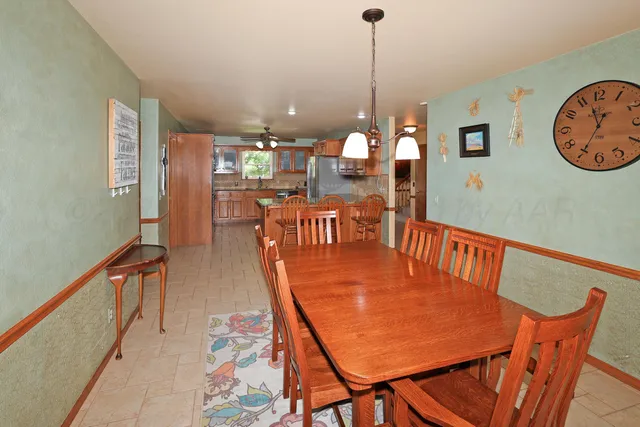 a bedroom with a bed and a dresser in it
