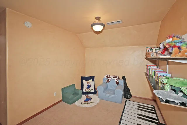 a bathroom with a sink a toilet a mirror and shower curtain