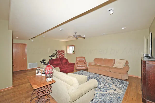 a bedroom with a bed and chair