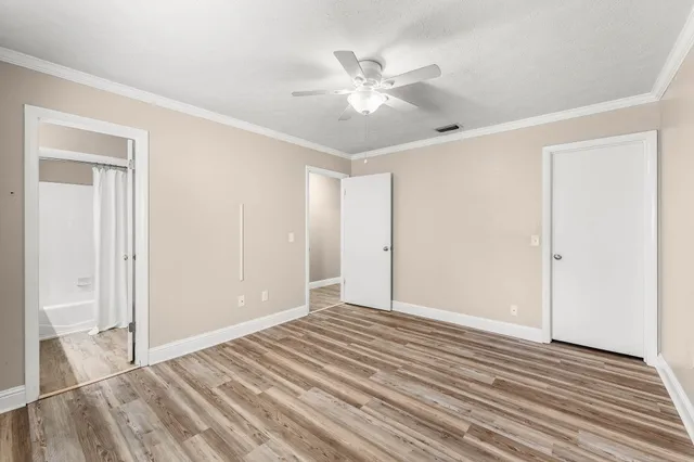 a bathroom with a double vanity sink and mirror
