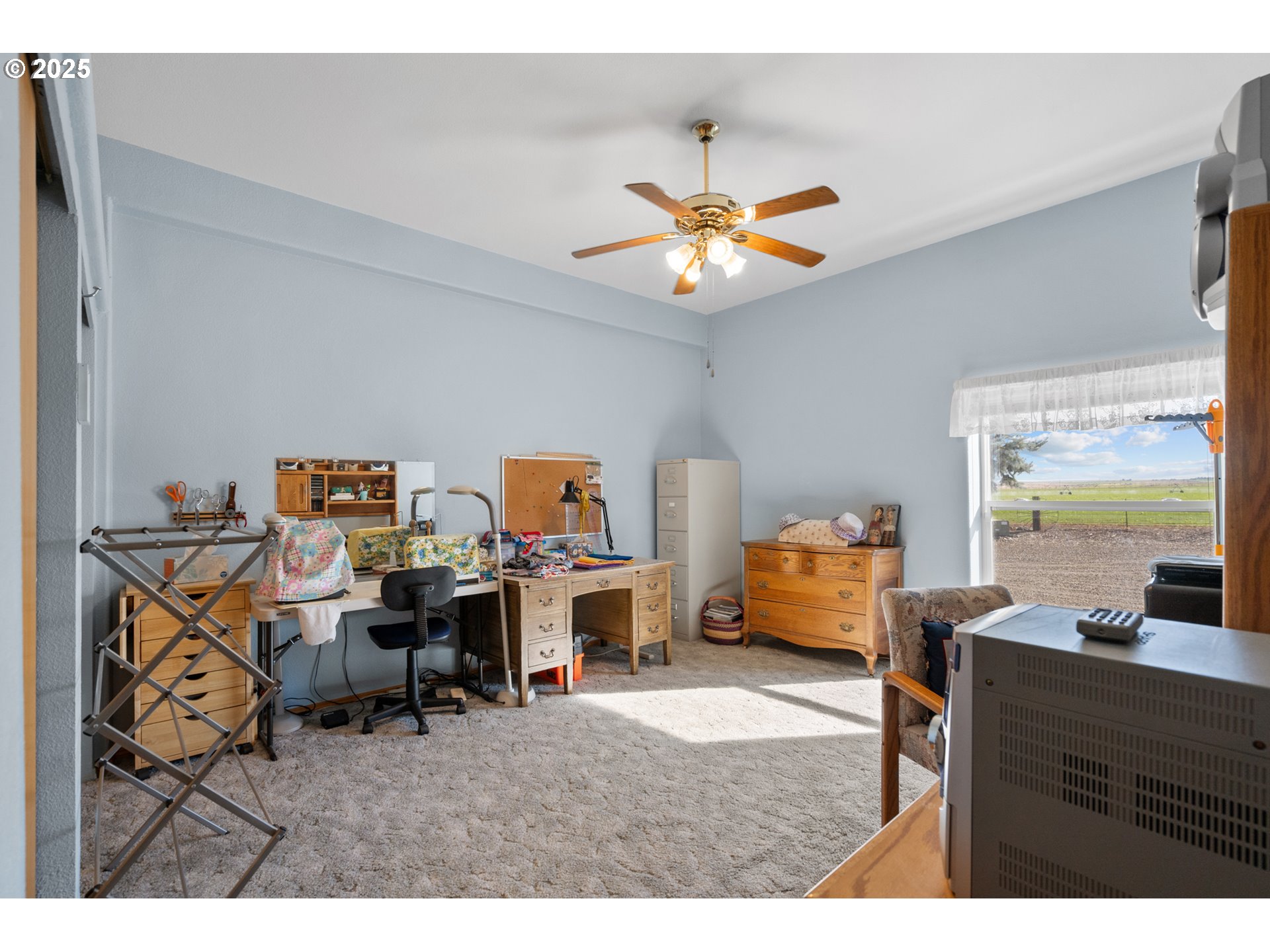 34656 County 1172 Road Stanfield, OR 97875 - Photo 13 of 47 a workspace with furniture and a window