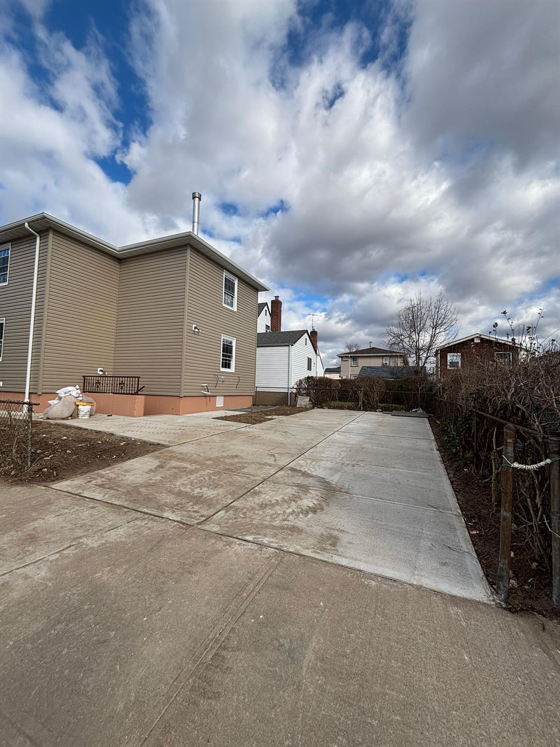 175-04 145th Drive Queens, NY 11434 - Photo 10 of 10 a view of a house with a yard