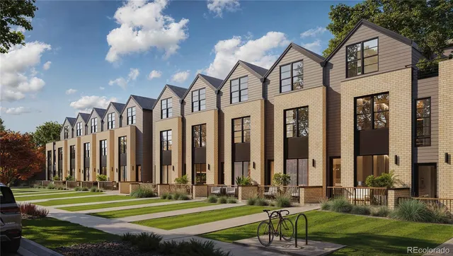 a view of a big building in front of a big yard