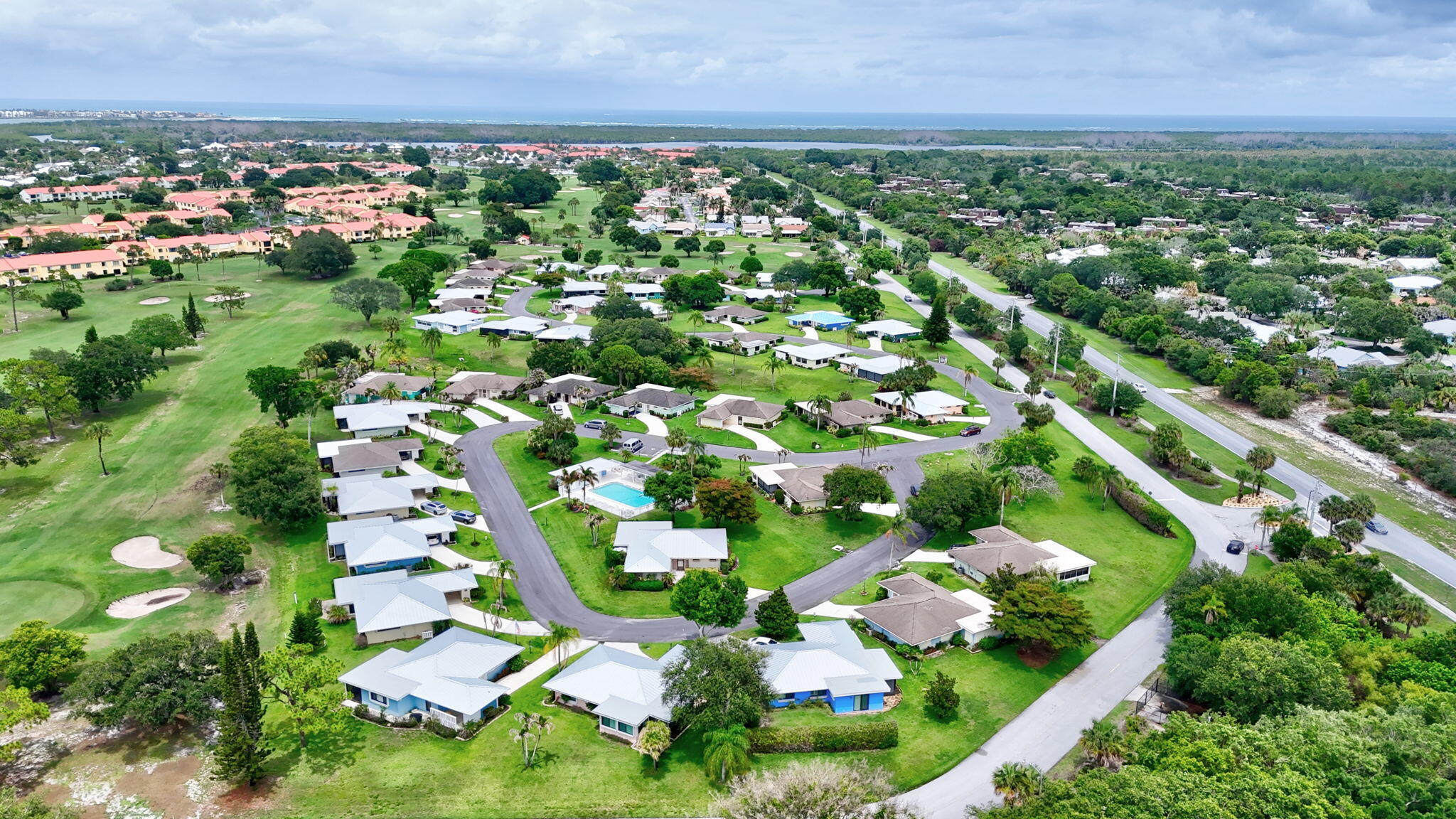 5251 Southeast Sea Island Way Stuart, FL 34997 - Photo 65 of 68 an aerial view of multiple house