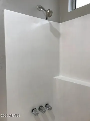 a close view of shower tap