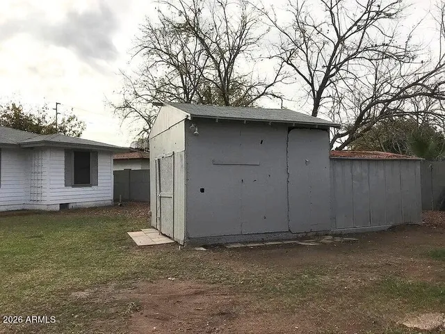 a house with a tree in front of it