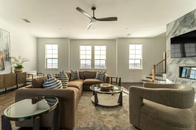 a living room with furniture and a window