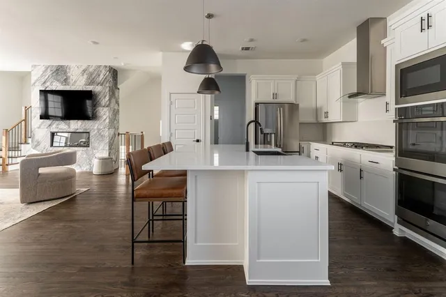 a front view of a house with yard