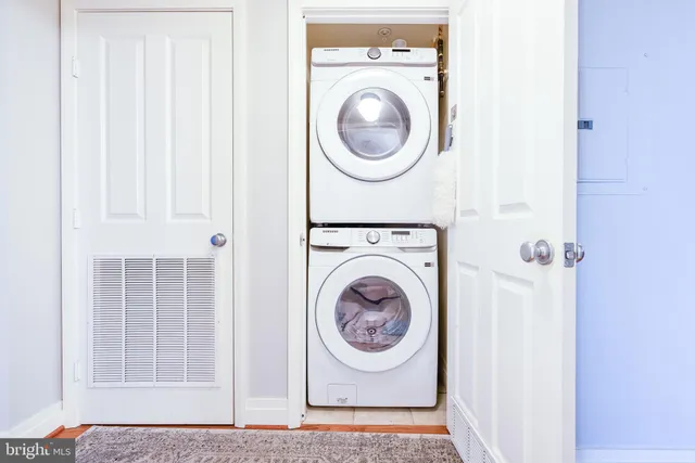 a swimming pool with outdoor seating and yard