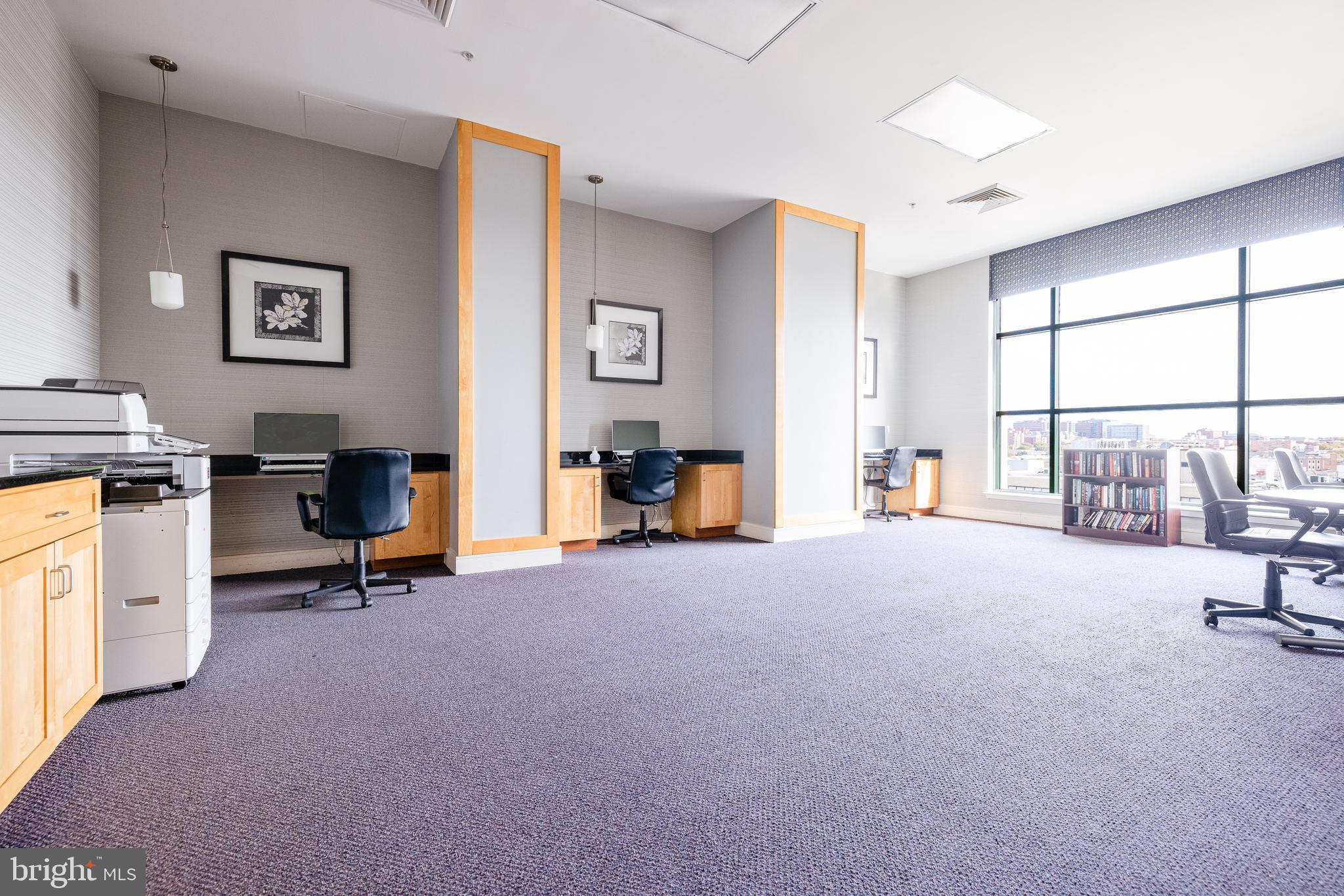 414 Water Street, Unit 1108 Baltimore, MD 21202 - Photo 36 of 36 a view of a livingroom with workspace and a window