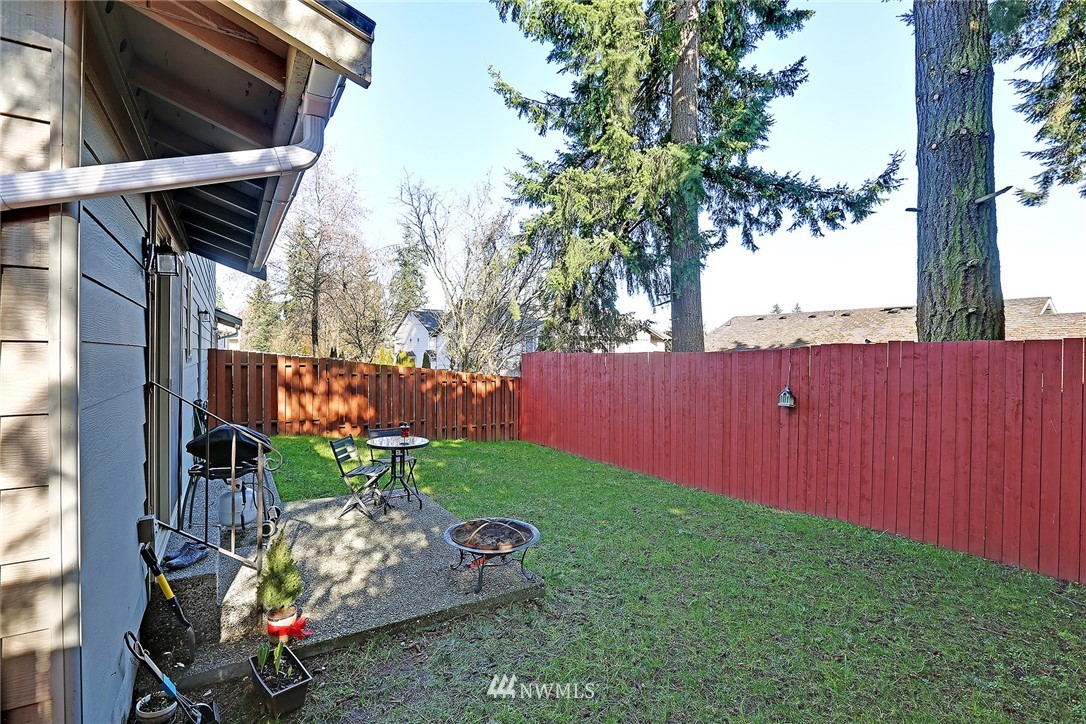 6513 Cady Road Everett, WA 98203 - Photo 11 of 11 a backyard of a house with lots of green space